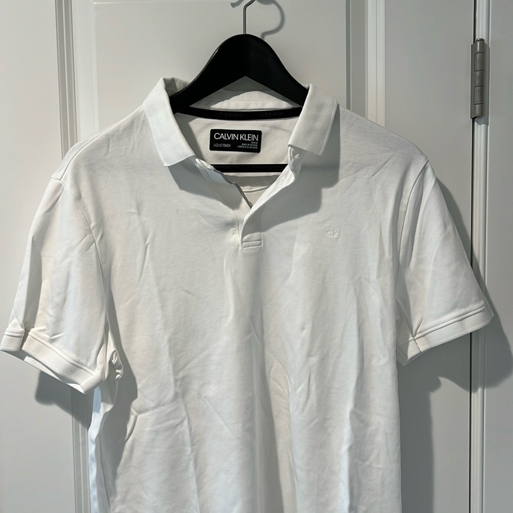 Never Worn: White Liquid Touch Calvin Klein Polo